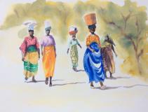 African women carrying washing